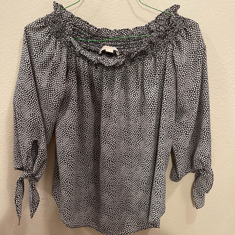 Michael Kors woman’s blouse size medium.
